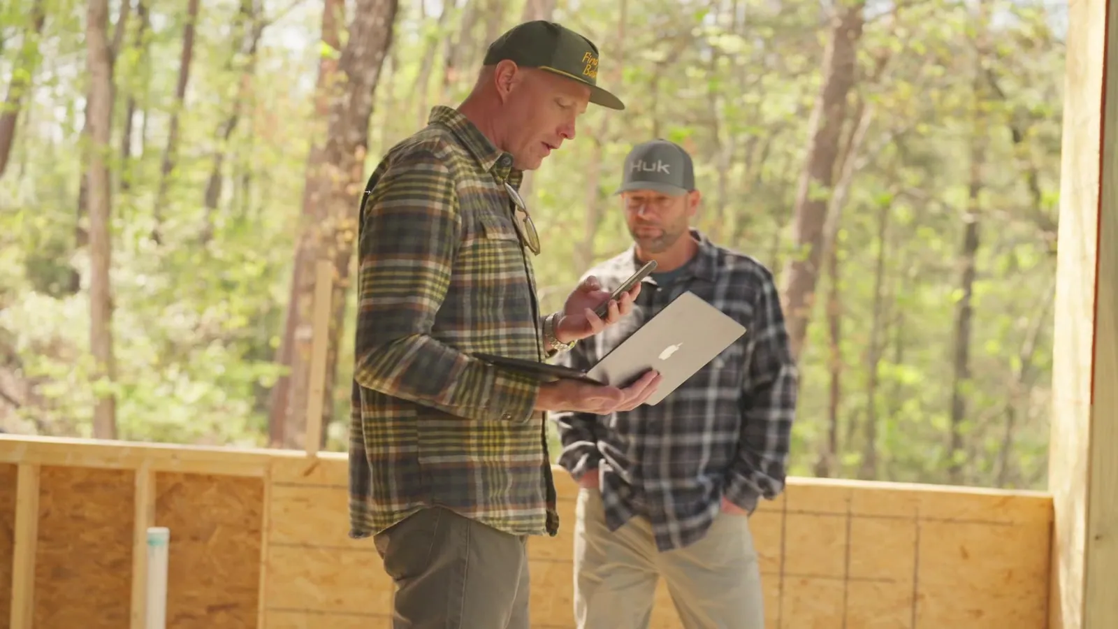 Derek and Shannon reviewing plans on site