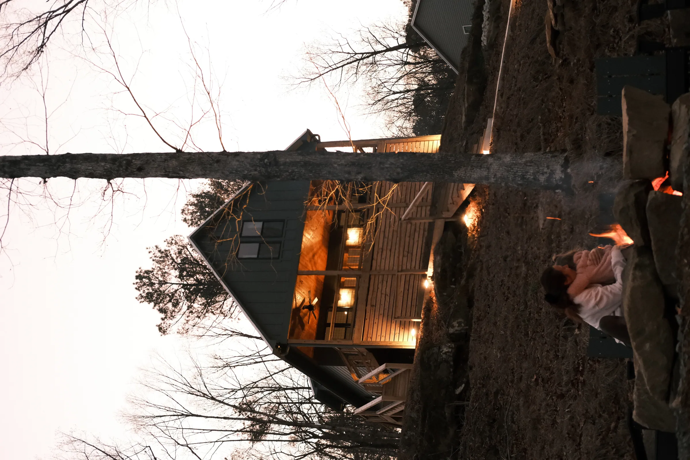White Oak at dusk, firepit glowing below
